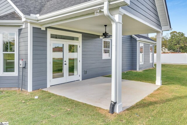 exterior space featuring ceiling fan