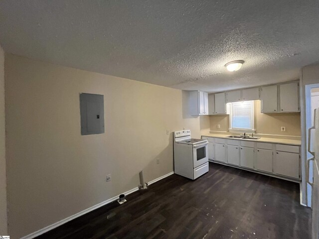 kitchen featuring electric panel, baseboards, dark wood-style floors, light countertops, and white range with electric cooktop