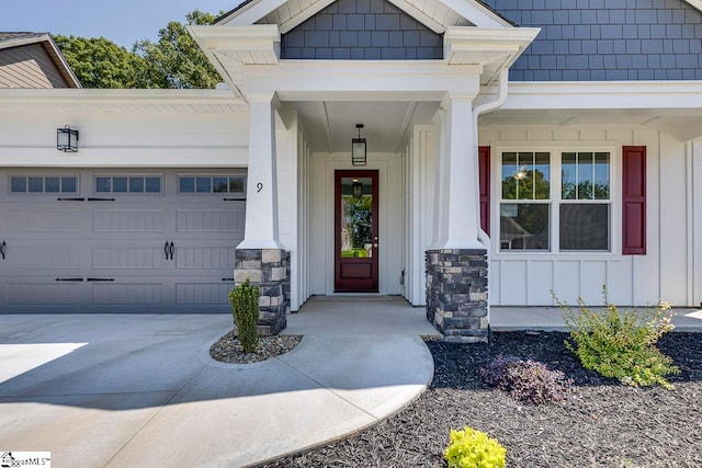 doorway to property featuring a garage