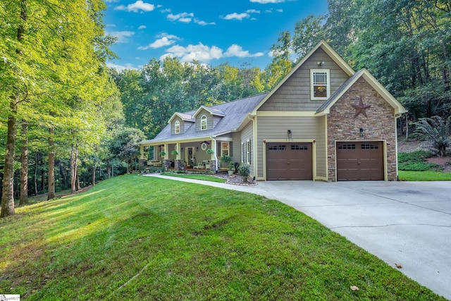 view of front of property featuring a garage and a front yard