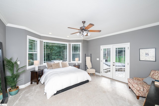 bedroom featuring ceiling fan, access to outside, french doors, carpet floors, and crown molding