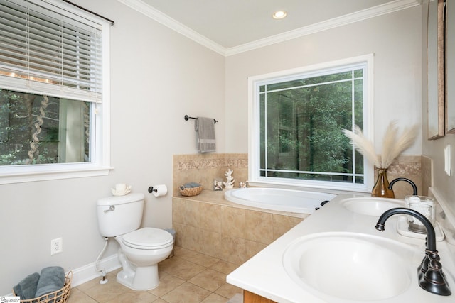 bathroom featuring ornamental molding, vanity, tile patterned flooring, tiled tub, and toilet