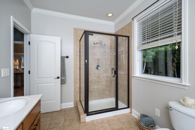 bathroom featuring tile patterned floors, toilet, an enclosed shower, and vanity