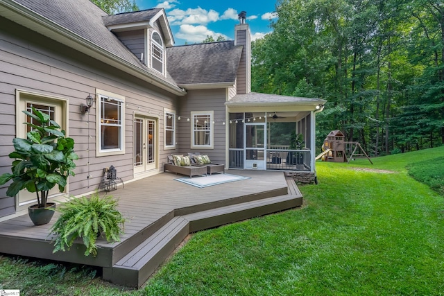 wooden deck featuring a yard