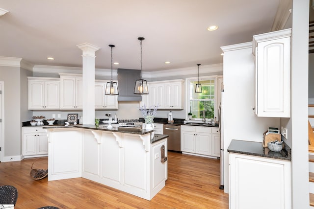 kitchen with a kitchen island, light hardwood / wood-style flooring, white cabinets, and stainless steel dishwasher