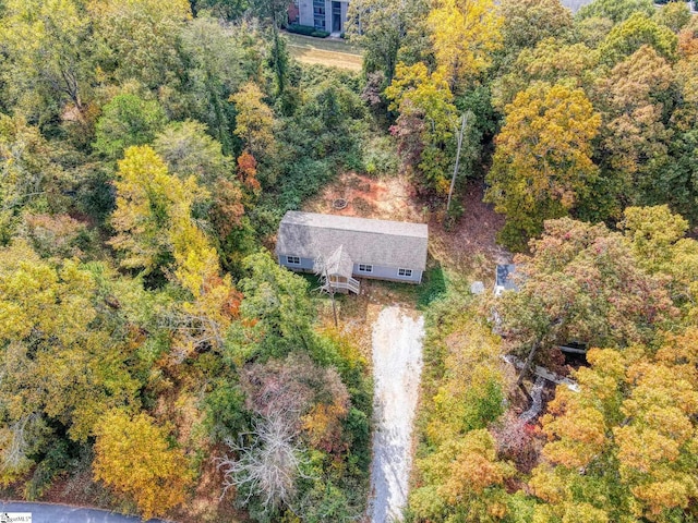 bird's eye view featuring a forest view