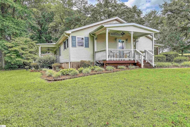 view of front of house with a front lawn and covered porch