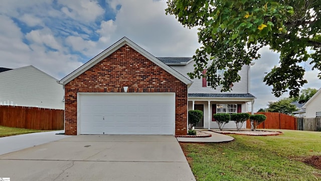 front of property with a garage and a front yard