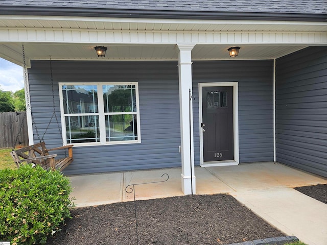 entrance to property with a porch