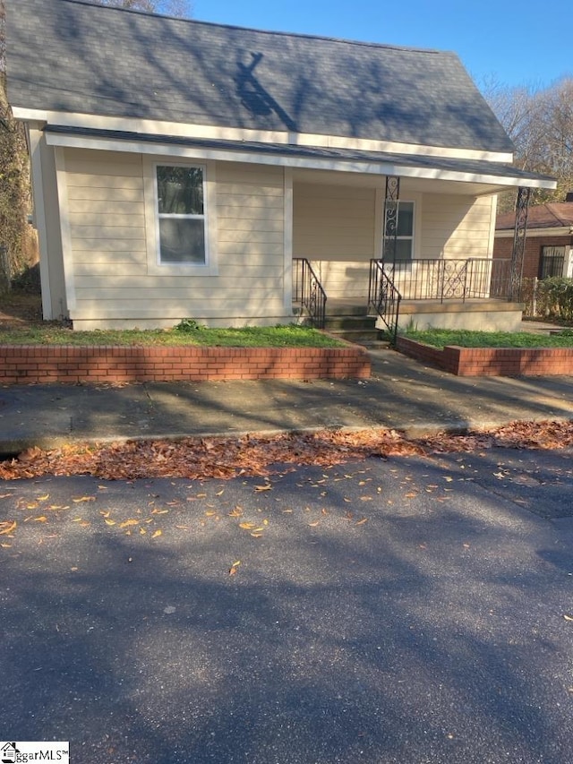 exterior space with a porch