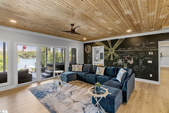 living room featuring ceiling fan, light wood-type flooring, wood ceiling, and a water view