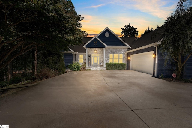 view of front of property featuring a garage