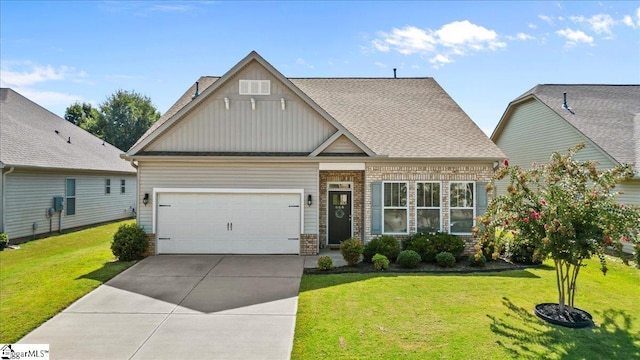 craftsman house featuring a garage and a front yard