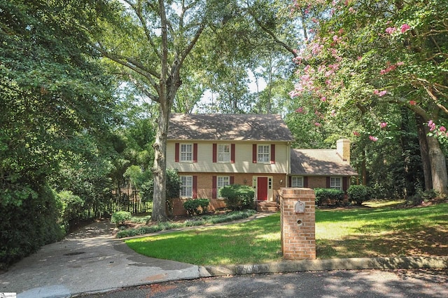 view of front of home with a front yard