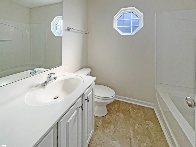 full bath featuring baseboards, vanity, and toilet