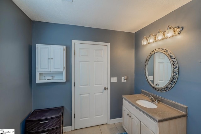 bathroom featuring vanity and tile patterned floors