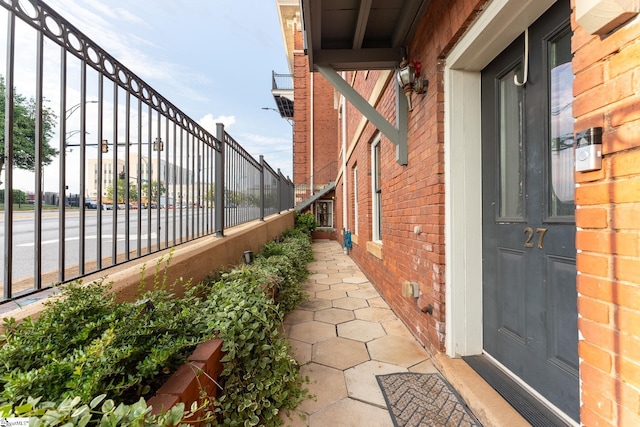 view of property exterior with brick siding