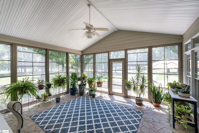 sunroom / solarium featuring vaulted ceiling and a ceiling fan