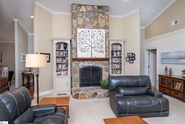 living area with visible vents, light colored carpet, a high ceiling, crown molding, and a stone fireplace