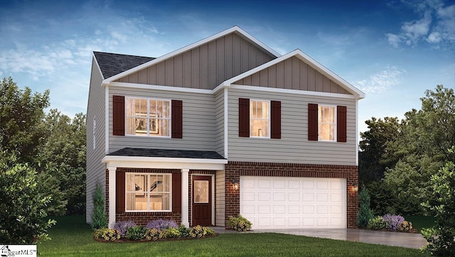 view of front facade featuring a garage and a front yard