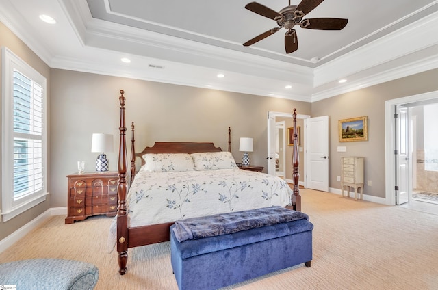 bedroom with light colored carpet, connected bathroom, crown molding, and ceiling fan