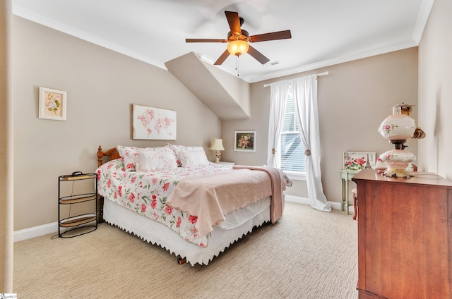 bedroom with ceiling fan, ornamental molding, and carpet floors