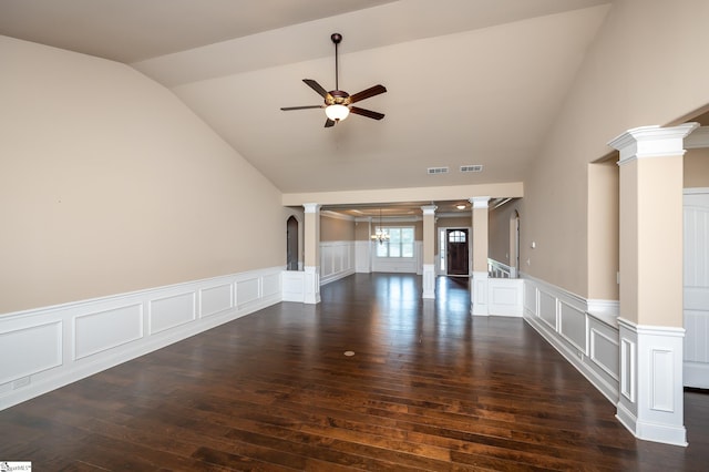 unfurnished living room with dark wood-type flooring, ceiling fan, and ornate columns