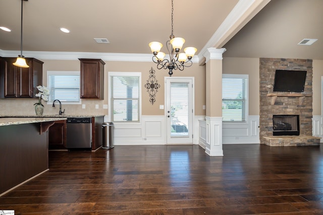 kitchen with decorative backsplash, dishwasher, plenty of natural light, and dark hardwood / wood-style flooring