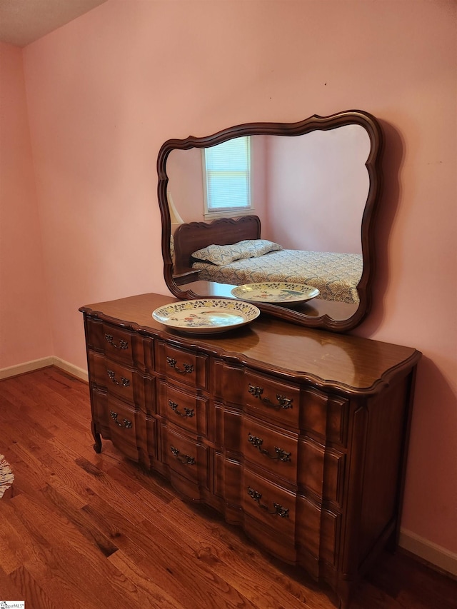 bathroom featuring wood-type flooring