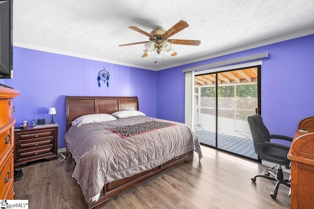 bedroom featuring a textured ceiling, access to exterior, ceiling fan, and wood-type flooring