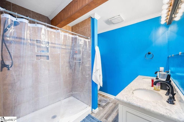 bathroom with vanity, a shower with curtain, and hardwood / wood-style floors