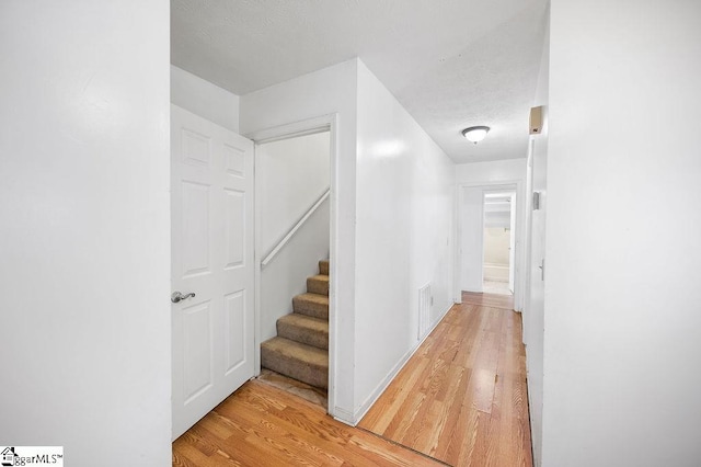 hall featuring light wood-type flooring