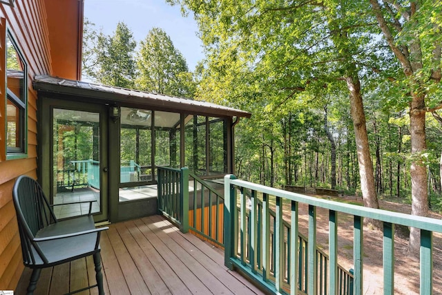 deck featuring a sunroom