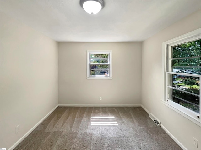 empty room featuring carpet