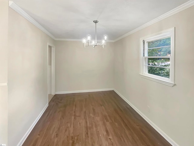 empty room featuring crown molding, a notable chandelier, and dark hardwood / wood-style flooring