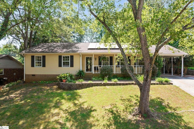 single story home featuring a porch, a front lawn, and a carport