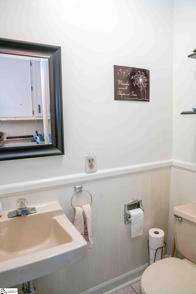 bathroom with toilet and sink