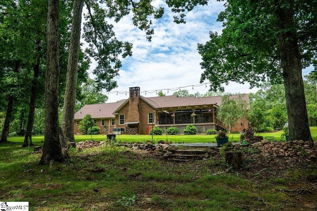 exterior space featuring a front yard