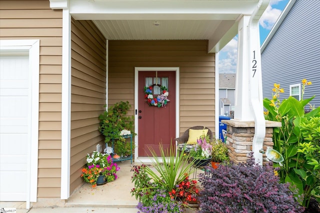 127 Addington Ln, Simpsonville, SC 29681 - property entrance with covered porch and a garage