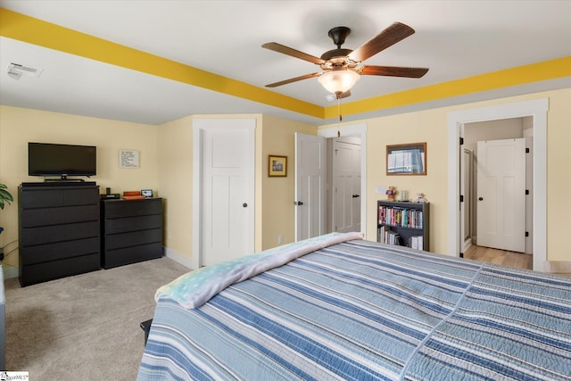 127 Addington Ln, Simpsonville, SC 29681 - bedroom with light carpet, baseboards, ceiling fan, and visible vents