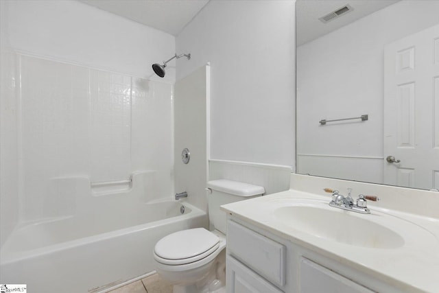 full bathroom with tile patterned floors, a textured ceiling, toilet, vanity, and bathtub / shower combination