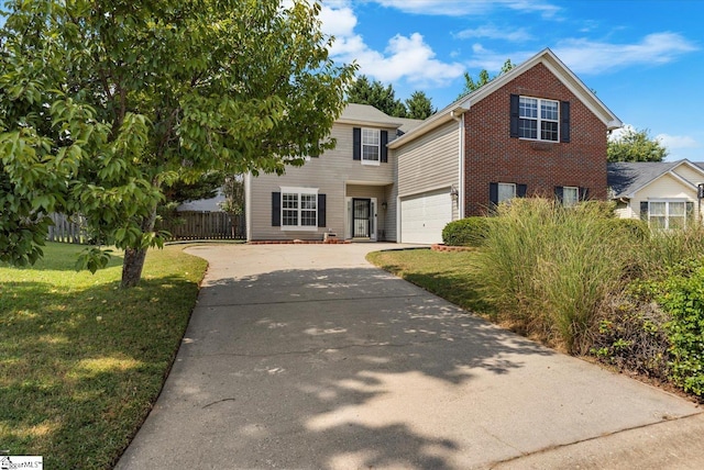 view of front facade featuring a garage and a front yard