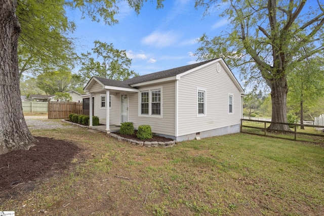 view of home's exterior featuring a yard