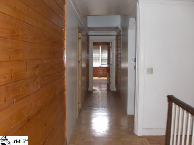 corridor with wood walls