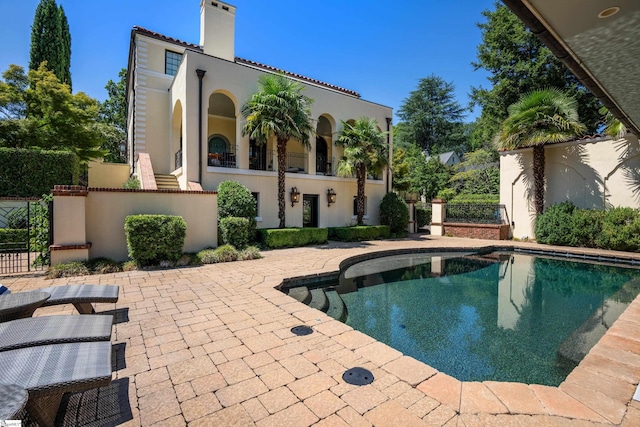 view of pool with a patio