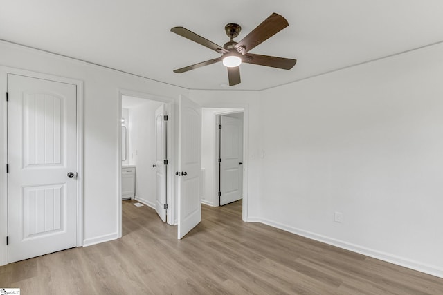 unfurnished bedroom with light wood-type flooring and ceiling fan