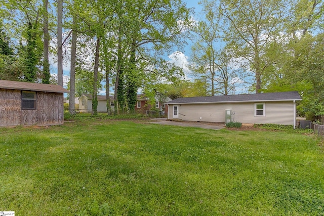 view of yard featuring central AC