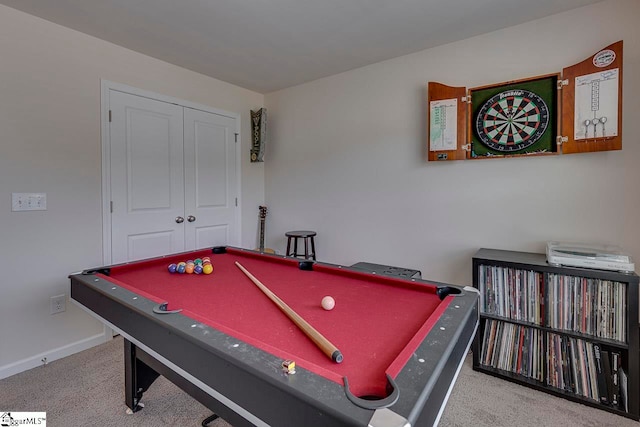 rec room with pool table and light colored carpet