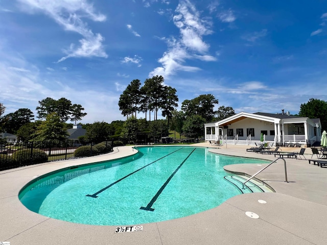 view of pool featuring a patio