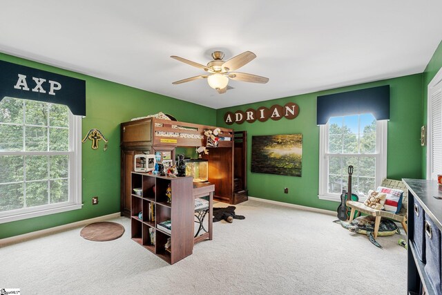 carpeted bedroom with ceiling fan